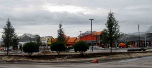 Work continues at a brisk pace at the new shopping complex on County Road 466A.
