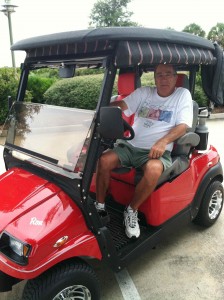 Ron Clark of the Village of Lynnhaven enjoys a beautiful morning in his golf cart.