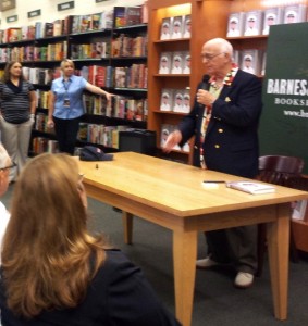 Gavin MacLeod speaks to Villagers Wednesday at Barnes and Noble.