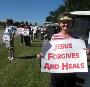 Marge Amtower of the Village of Piedmont takes part in a Pro-Life demonstration Sunday on 27/441.