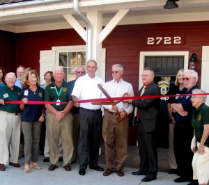 The official ribbon is cut at the new Seniors vs. Crime office in Brownwood.