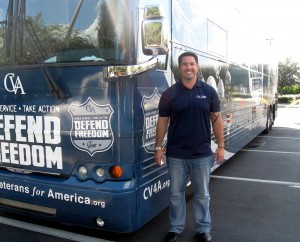 Sean Parnell, a former Army Ranger and author of the New York Times bestseller “Outlaw Platoon,” with the Defend Freedom bus.