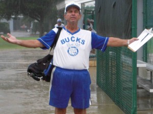 ucks' manager Mike Doyle implores Mother Nature, "Why on softball day?"