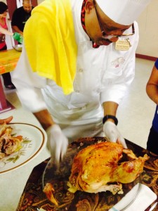 Chef Steven Aponte carves the first Turkey