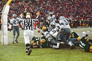 Bart Starr scores the game-winning TD in the famed 1967 Ice Bowl. 
