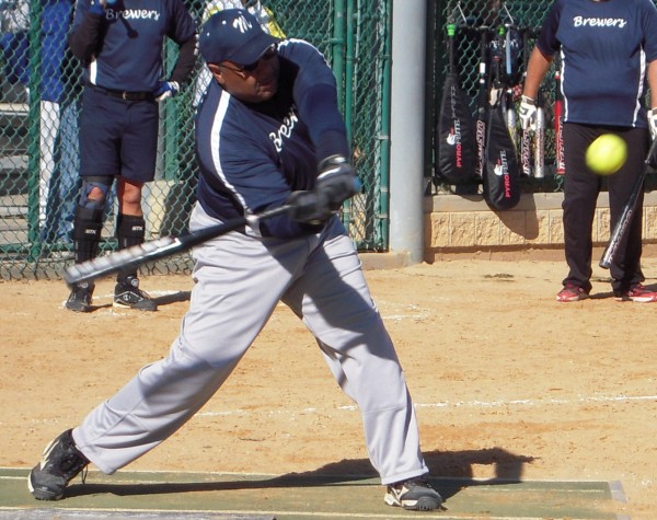 Ted Bristol's inside -out swing gives the Brewers another man on base.