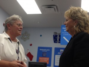 Cindy Nazzaro (right) of Parady Financial Group speaks with Debra Davis (left), the Wal-Mart employee who helped Greg Parady pay off over $20,000 in layaway purchase for unknowing shoppers