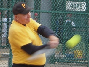 John Barrett connects for a hit.