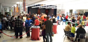 Many students and parents gathered in the cafeteria, where they made craft items and cookies.