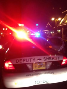 A Sumter County Sheriff's Office squad car Saturday night at Lake Sumter Landing Market Square.