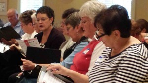 Villagers take part in the new choral group on Saturday.