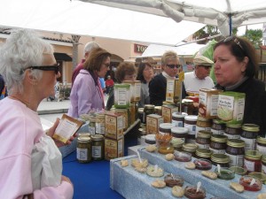 Dianne Wynne, right, talks to a potential customer about her jams and jellies.