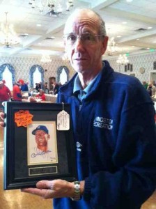 Villager Joe Dudik shows off some of his Mickey Mantle memorabilia.