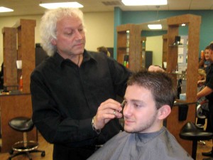 Mark Brodeur styles VHS senior Alex Hall's hair at Root 466 salon. 