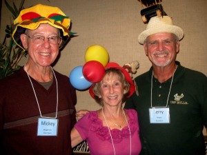 Mickey Baughman, Sandra Ricciardi and Jerry Hasara, from left, model 'crazy hats' at Tuesday's Daybreak program. All three help run the program.