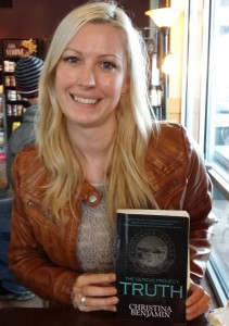 Christina Benjamin with her book, The Geneva Project: Truth.