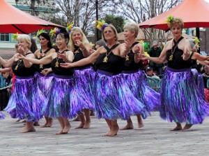 Aloha 'O Ka Hula Dance performs for the crowd at Mardi Gras.