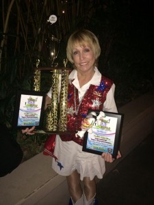 Villager Ann Pelle shows off awards the Villages Twirlers won this weekend at Twirl Mania. 