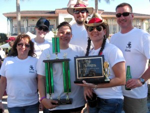 Commercial Property Management shows off the awards won at Saturday's BBQ Bash. 