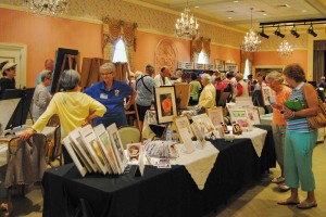 Art enthusiasts enjoyed browsing aisles of fine colored pencil paintings at Colony Cottage Rec Center. The Colored Pencil Painters Guild Spring Jubilee was held all day Saturday.