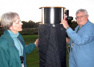 Joan Rockwell gets a lesson in stargazing from Bruce Sinclair of the Villages Astronomy Club.