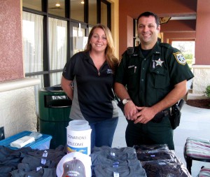 Michelle Keszey and Jeremy Williams of the Sumter County Sheriff's Office worked the reception table at Tip A Cop.