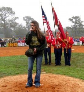 Samantha Karoly sings the National Anthem on opening day of Lady Lake Little League.