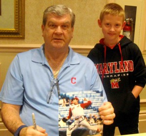 'Sudden Sam' McDowell shows off an autographed photo for 11-year-old Casey Grantham.