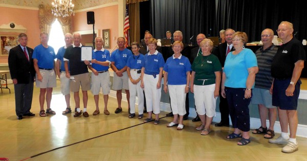 Sumter County Commission Chairman Al Butler, far left, presented a proclamation to Helping Hands on Tuesday evening.
