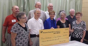  Volunteers from Seeds of Hope present a symbolic check to the Wildwood Soup Kitchen. 