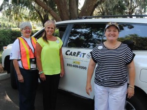  Fran Carlin-Rogers, Sherri Krummel and Cauina Watts, serving as Outreach Coordinators of the CarFit Program, helped Freedom Pointe residents evaluate the safety and comfort features of their cars.​ 