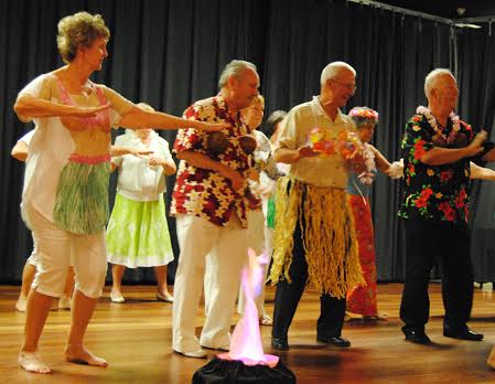 Deutscher Club members, including males with coconut and flower bras, cavorted on stage with the Friends of Hula dancers.
