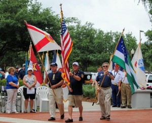 The retired New York Police Department group placed a colorful wreath at the memorial.