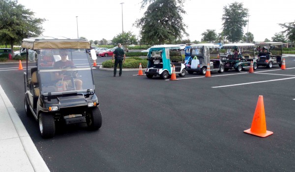 Camp Villagers learn about golf cart safety at Colony Cottage Recreation Center.