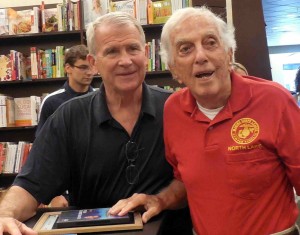 Oliver North and Bill Cumbaa.