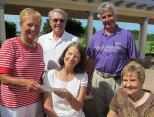 The Villages Musical Company recently donated $5,000 to Villagers for Hospice. Pictured in the photo, from the left, are Karen McIntosh of Hospice, Bev Wehrheim, VMT treasurer; Sandie Hawthorne, VMT chairperson, and in the back, VMT board members Bill Davis and Bill Krone. 