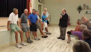 A detective, played by actor John Maynard, asks six residents to demonstrate their dance moves at Duval’s murder mystery event.