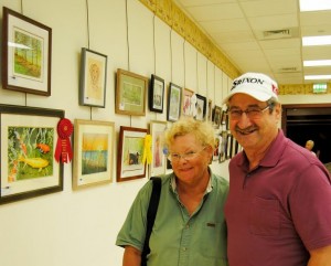 Vicky Rhodes and Joe Fernandez thought the color pencil art looked like paintings or photographs.
