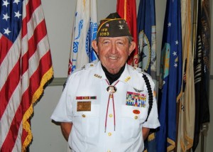 Villager Bob Seguin heads the VFW Honor Guard.