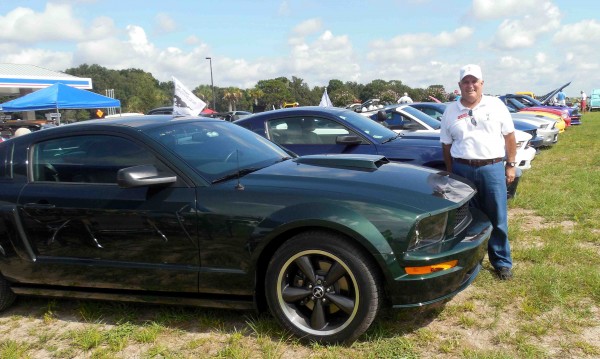 Joe Singleton of the Villages Mustang Club shows off his Mustang.