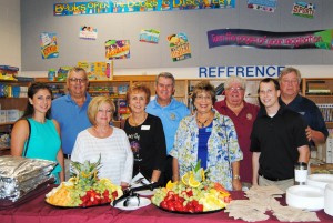 . Poised to break out the teachers' breakfast at Lady Lake Elementary School were (front) Kat Pantazi, Phyllis Tess, Grata Keene, Carol Pozen and Matt Sugular... and (back row) Bob Gonyou, Paul Farineau, Ira Pozen and Dennis Demsha.