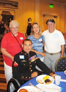 Friends Shirley and Jack Seamand, from Inverness, brought Purple Heart recipient, Marine Lance Cpl. Michael Delancey, from Pinellas Park, and his grandmother, Connie Danaway, from Homosassa, to enjoy the evening.