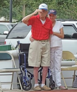 Don Chaplin salutes with some support from his wife, Carol. (Ron Clark photo) 