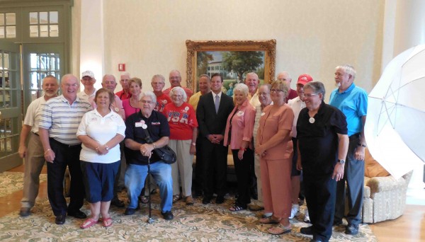 Members of The Villages Party pose for a photo with Lt. Gov. Carlos Lopez-Cantera.  