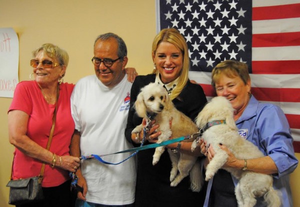 Tamarind Grove residents Eddie and Susan Doran, plus poodles 'Sugar' & 'Spice' with Pam Bondi and State Rep. Marlene O'Toole. 