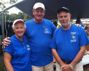 Len Robertson, center, with Linda and Paul Bowman.