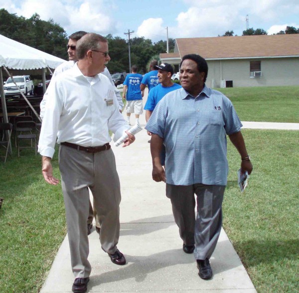 Congressman Rich Nugent walks with Malcolm Mosley, administrator of House of Hope at an event in 2014. 