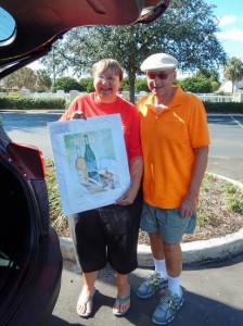 Kriste and Lloyd Strasburg loaded their new painting in their SUV.