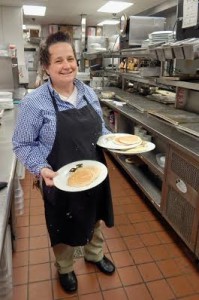 Kathy Hynes, dished up the pancakes at R.J. Gator's restaurant.