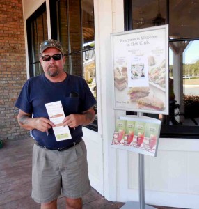Dennis Hannigan checks out the menu at McAlister's Deli..